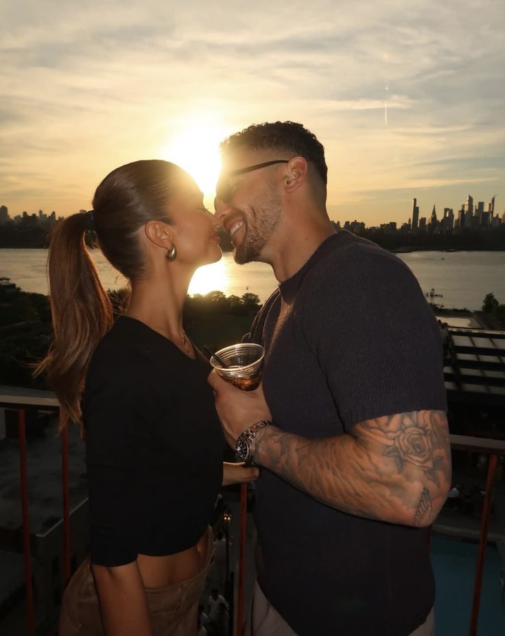 Couple sharing a sunset kiss in London